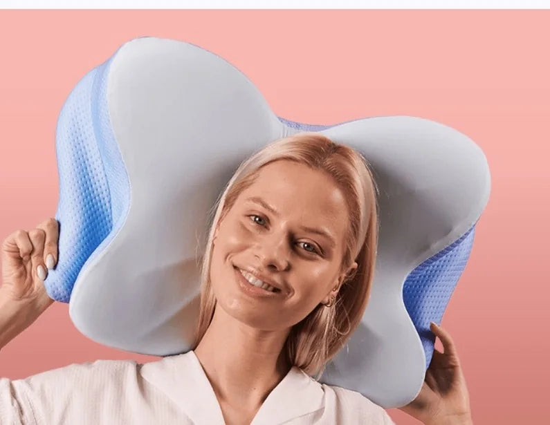 Mujer feliz con su almohada Alinea Ergo